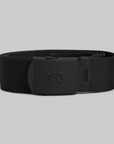 Y-3 Classic Logo Belt Black — coiled belt showing black jacquard webbing and embossed Y-3 metal buckle clasp