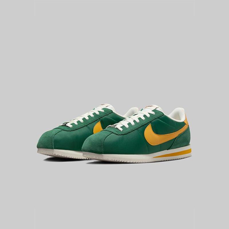 green and yellow nike cortez