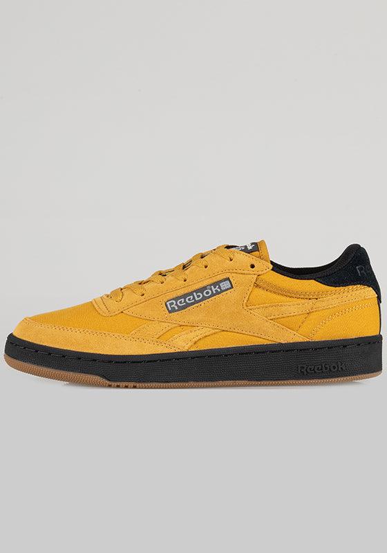 Reebok revenge best sale plus black yellow