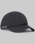 Black cap with 'NOCTA' branding on a gray background
