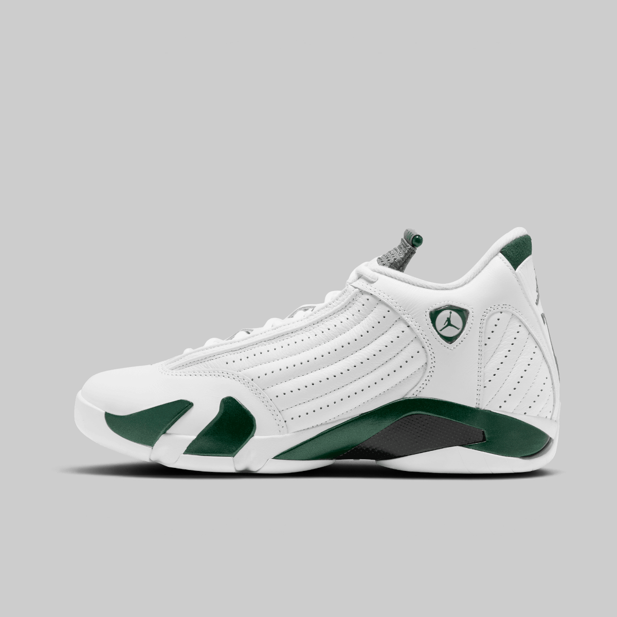 A white and dark green Nike Air Jordan 14 Retro sneaker shown from a side profile view against a solid gray background.