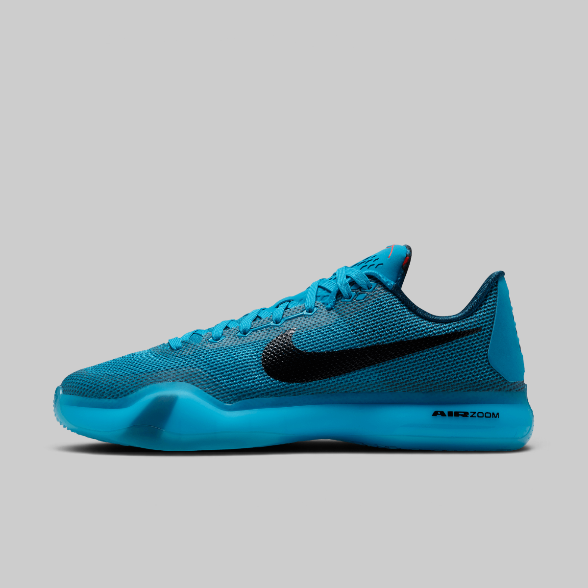A Nike basketball shoe in a vibrant blue and black colorway, shown from a side profile on a solid gray background.