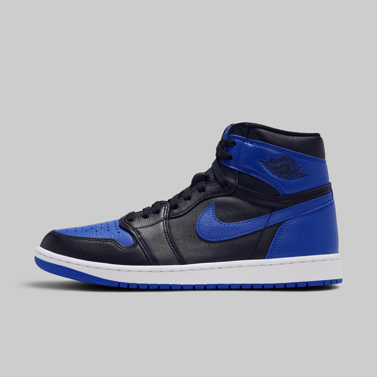 A classic high-top sneaker in black and royal blue leather with a white midsole, shown from the side against a solid gray background.