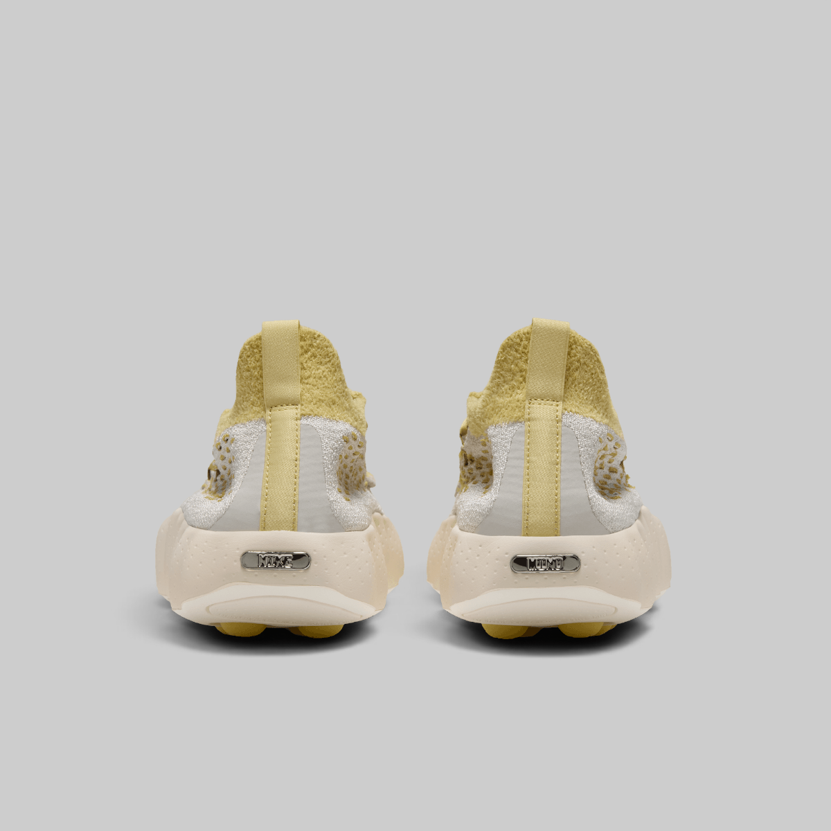 Mind 002 Flyknit QS - Light Bone