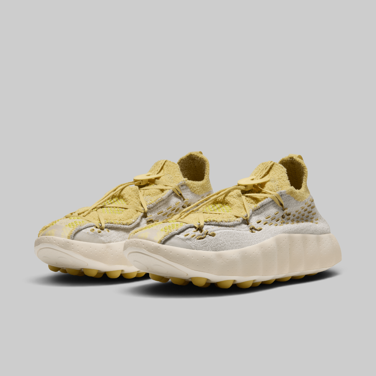 Mind 002 Flyknit QS - Light Bone