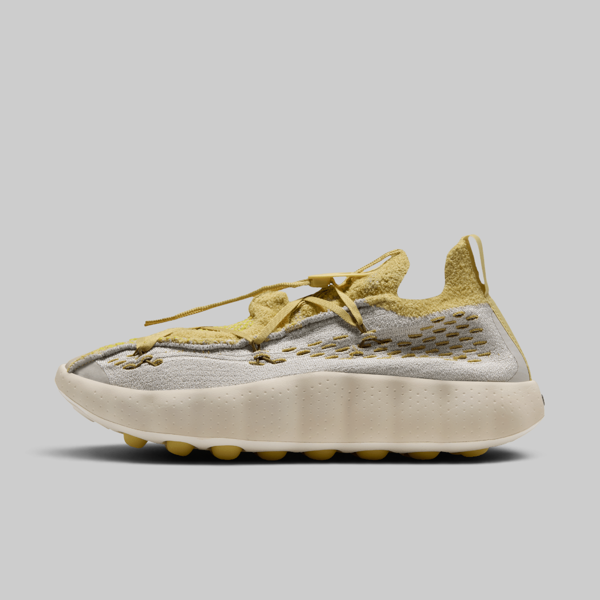 Mind 002 Flyknit QS - Light Bone