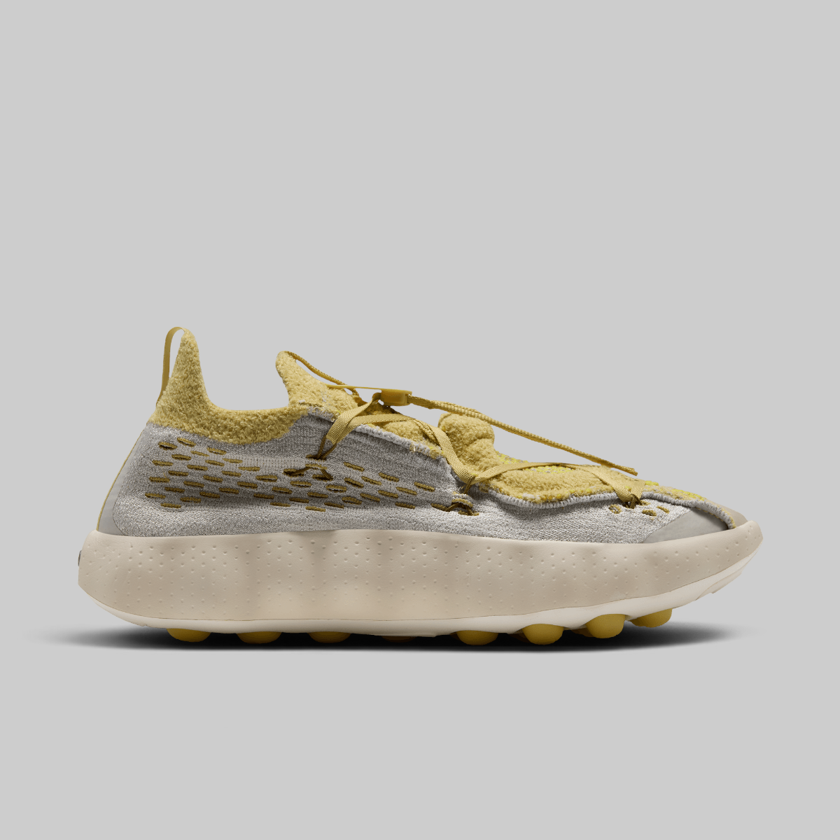 Mind 002 Flyknit QS - Light Bone