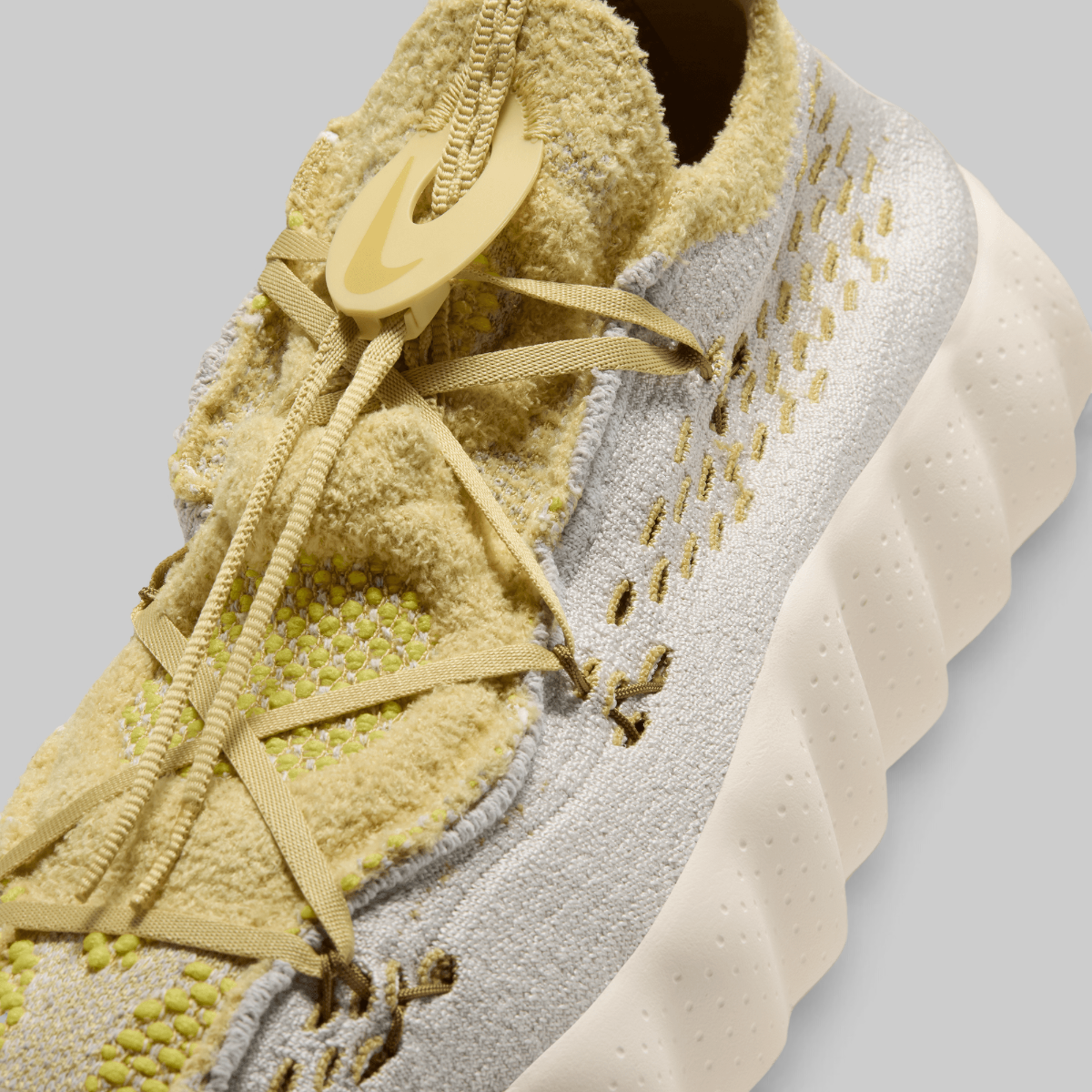 Mind 002 Flyknit QS - Light Bone