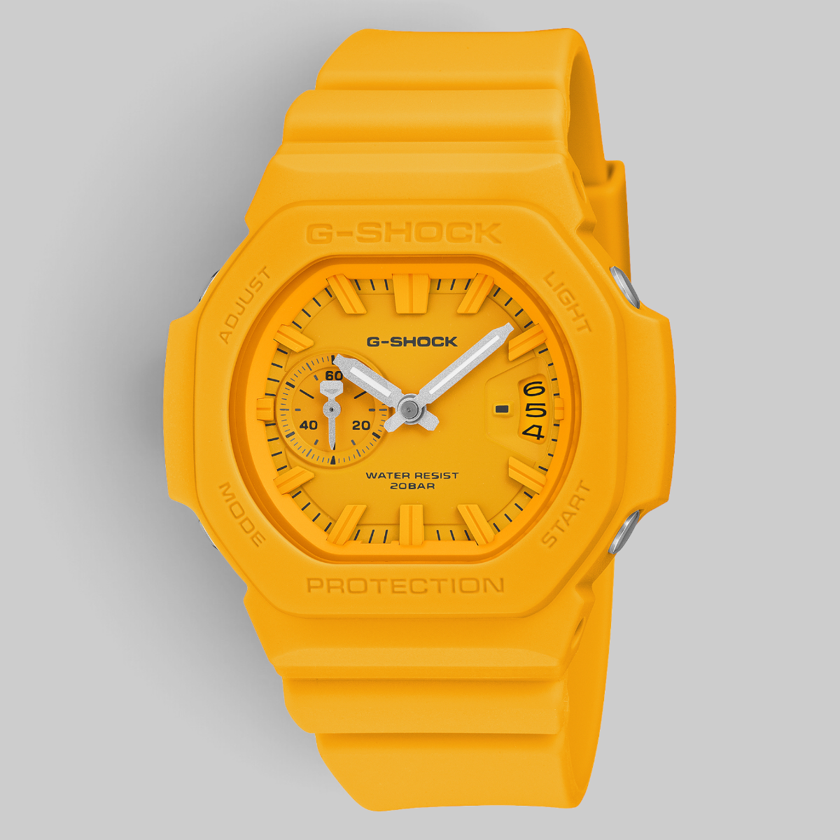 A G-Shock analog watch in a vibrant yellow colorway, featuring a matching yellow resin case and strap, with a yellow dial and white hands and markers.