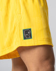 Brain Dead Disney Football Shorts - Bold Gold