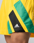 Brain Dead Disney Football Shorts - Bold Gold