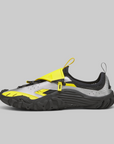 A Reebok water shoe in gray, black, and neon yellow, shown in a side profile on a solid gray background.
