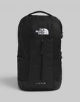 The North Face Lichen backpack in black, featuring a white printed logo on the front and a vertical zippered pocket, set against a solid gray background.