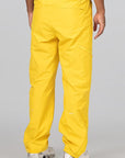 NOCTA X L'ART Tech Pant - Vivid Sulfur/Sail - LOADED