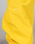 NOCTA X L'ART Tech Pant - Vivid Sulfur/Sail - LOADED